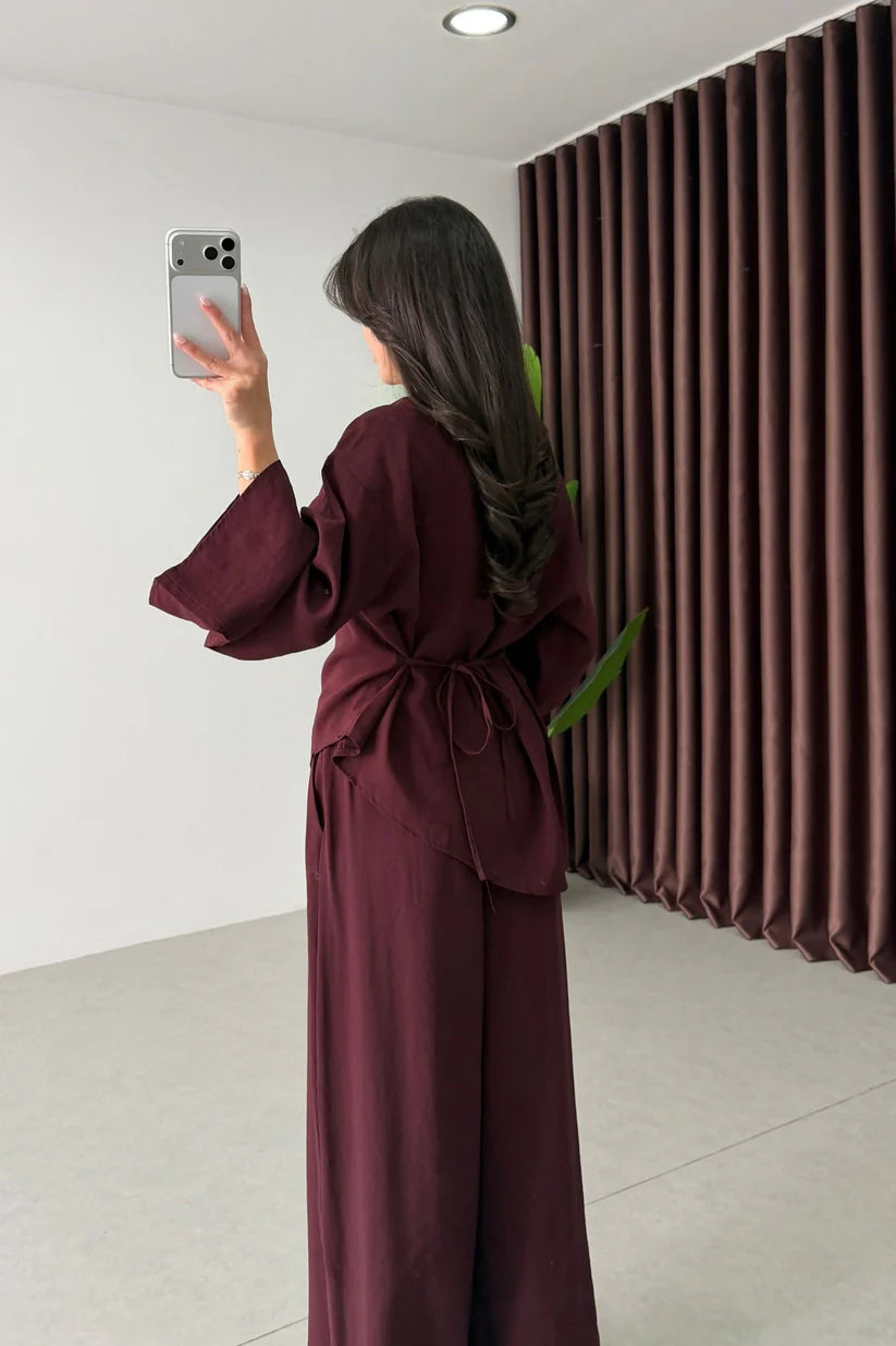 Modest co-ord set featuring a long-sleeve asymmetrical hem top and matching wide-leg trousers 09