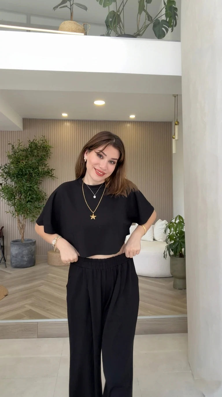 Two-piece lounge set featuring a short-sleeve crop top and matching high-waisted wide-leg trousers 05