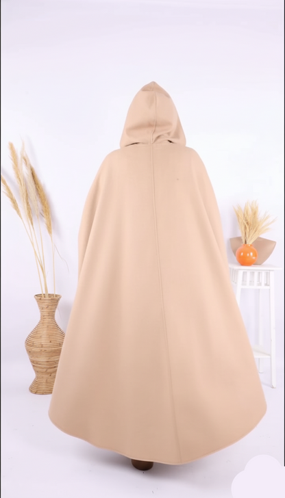 Beige hooded cloak on a white background