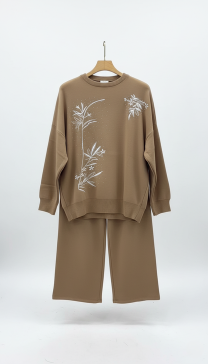 Brown outfit with floral embroidery on a white background winter co ord outfit 2026