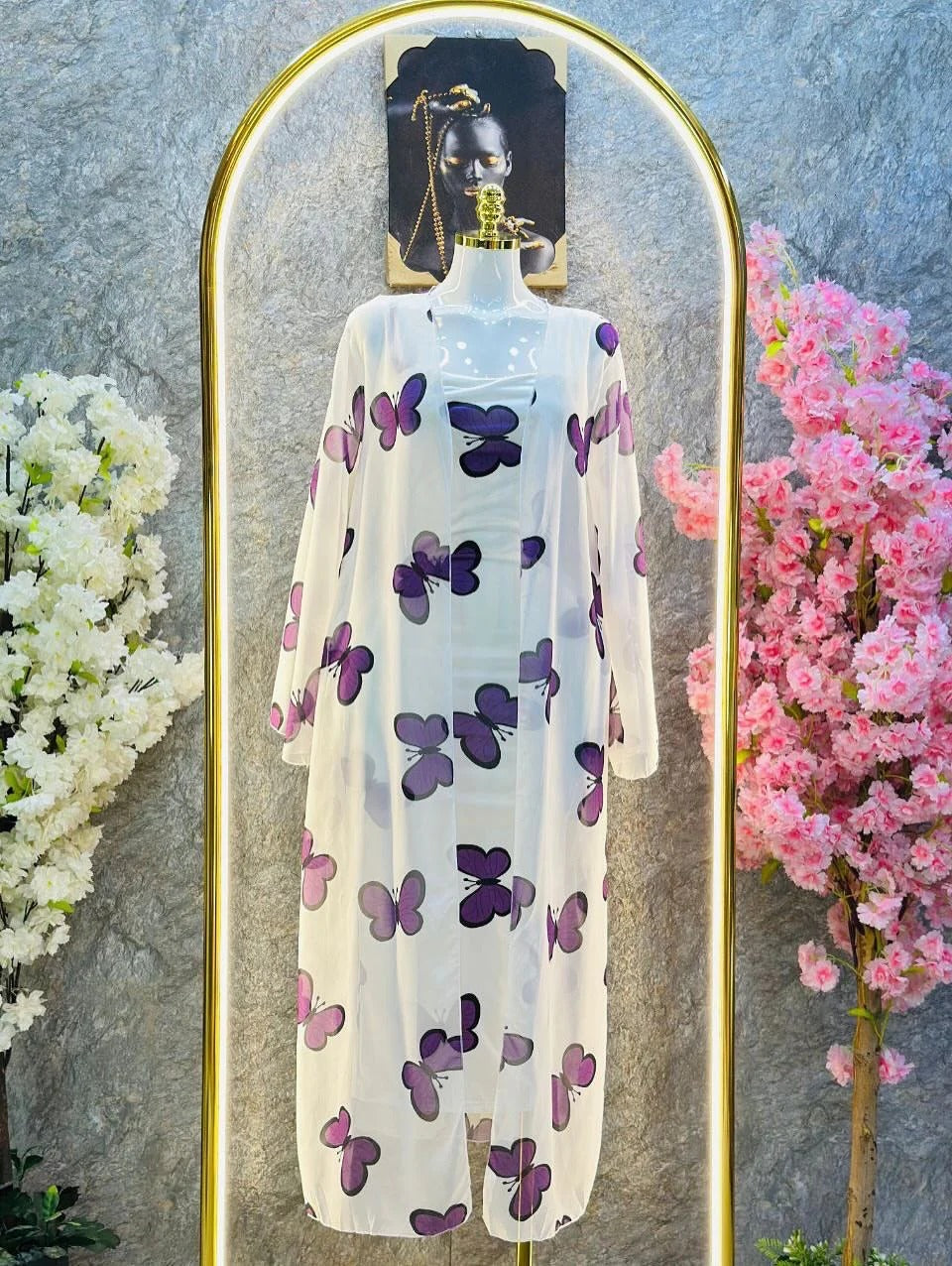 Butterfly print two-piece set with a long open shrug and matching inner dress. 01