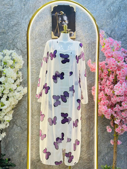 Butterfly print two-piece set with a long open shrug and matching inner dress. 01