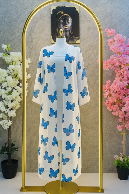 Butterfly print two-piece set with a long open shrug and matching inner dress. 02