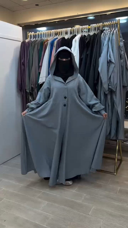 Chakoor 2026 Winter Button-Front Long Frill Hoodie for Women — premium fleece long hoodie with wide flare, two front buttons, frill hem, maxi-style winter outfit in original design, warm and stylish modest wear Pakistan