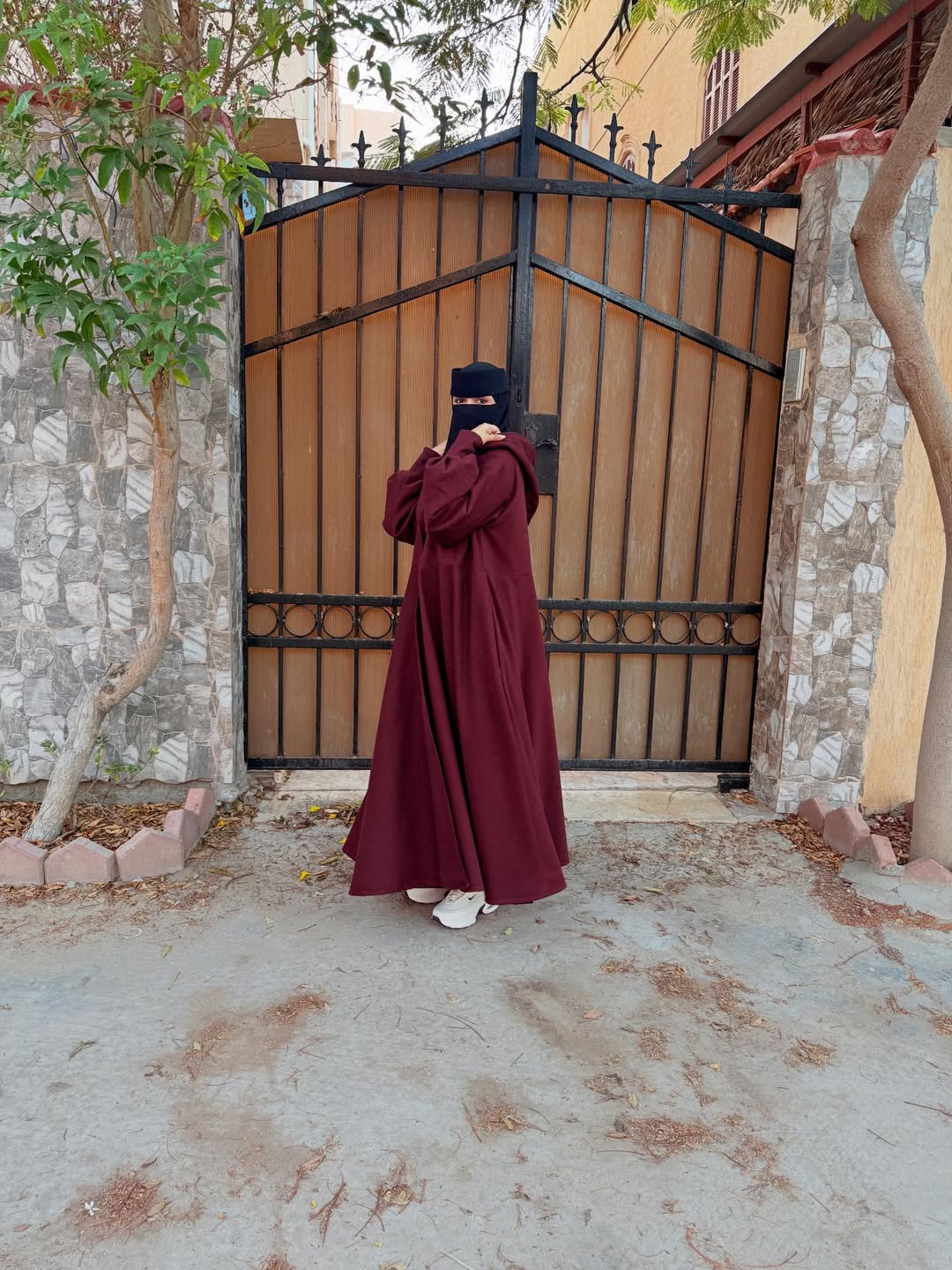 Chakoor 2026 Winter Button-Front Long Frill Hoodie for Women — premium fleece long hoodie with wide flare, two front buttons, frill hem, maxi-style winter outfit in original design, warm and stylish modest wear Pakistan 010