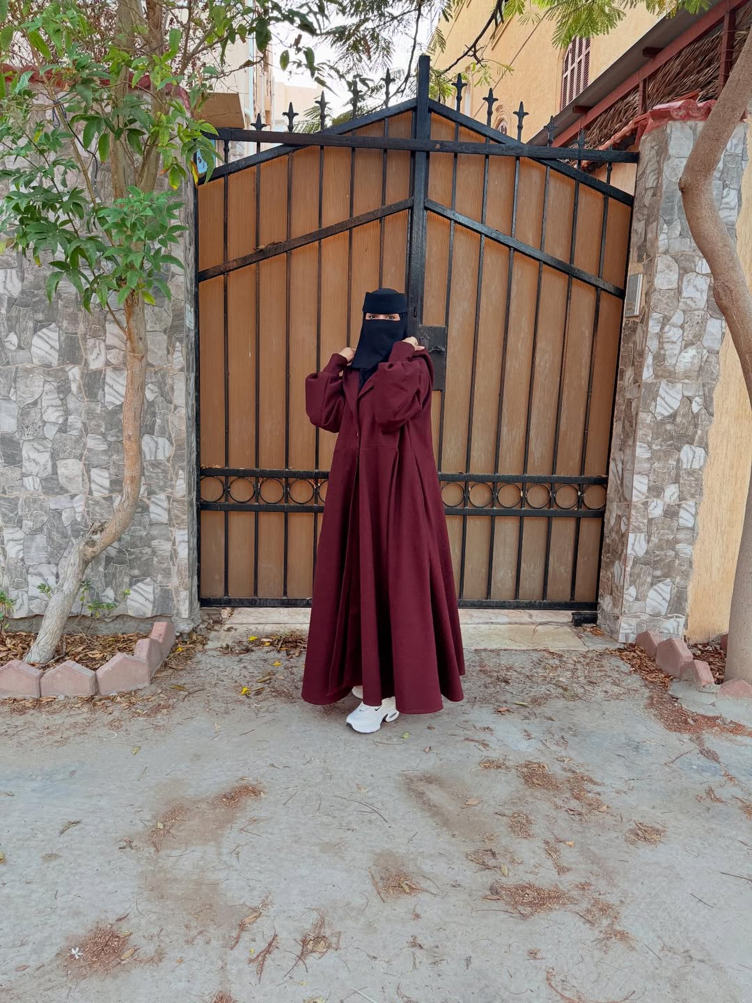 Chakoor 2026 Winter Button-Front Long Frill Hoodie for Women — premium fleece long hoodie with wide flare, two front buttons, frill hem, maxi-style winter outfit in original design, warm and stylish modest wear Pakistan 011