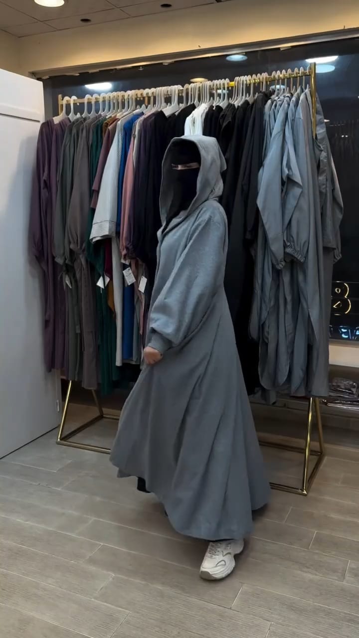 Chakoor 2026 Winter Button-Front Long Frill Hoodie for Women — premium fleece long hoodie with wide flare, two front buttons, frill hem, maxi-style winter outfit in original design, warm and stylish modest wear Pakistan 013