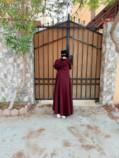 Chakoor 2026 Winter Button-Front Long Frill Hoodie for Women — premium fleece long hoodie with wide flare, two front buttons, frill hem, maxi-style winter outfit in original design, warm and stylish modest wear Pakistan 07