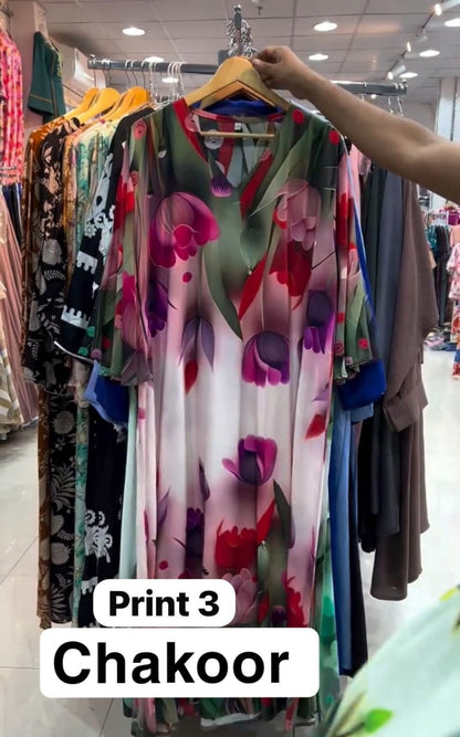 Chakoor Print 3 long floral dress featuring large pink and purple tulip patterns on a white background with blue cuff details.