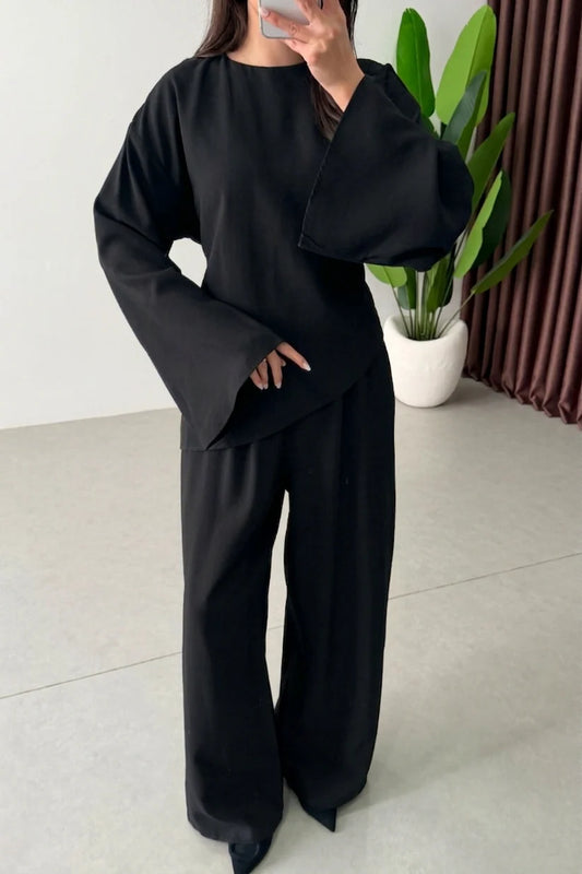 Modest co-ord set featuring a long-sleeve asymmetrical hem top and matching wide-leg trousers 01