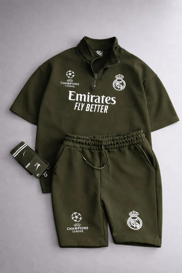 Real Madrid sports tracksuit set for women featuring short sleeve zip polo shirt and matching shorts with UEFA Champions League logo, Emirates Fly Better print and Nike socks 02