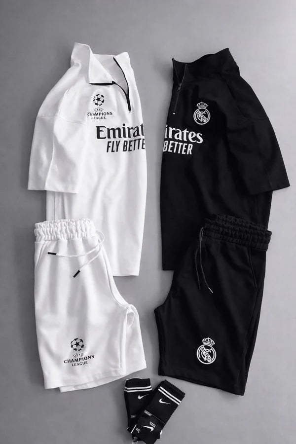 Real Madrid sports tracksuit set for women featuring short sleeve zip polo shirt and matching shorts with UEFA Champions League logo, Emirates Fly Better print and Nike socks 03