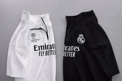 Real Madrid sports tracksuit set for women featuring short sleeve zip polo shirt and matching shorts with UEFA Champions League logo, Emirates Fly Better print and Nike socks 04