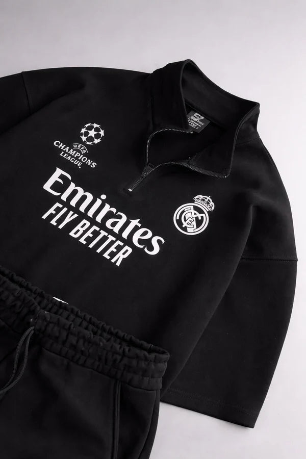 Real Madrid sports tracksuit set for women featuring short sleeve zip polo shirt and matching shorts with UEFA Champions League logo, Emirates Fly Better print and Nike socks 06