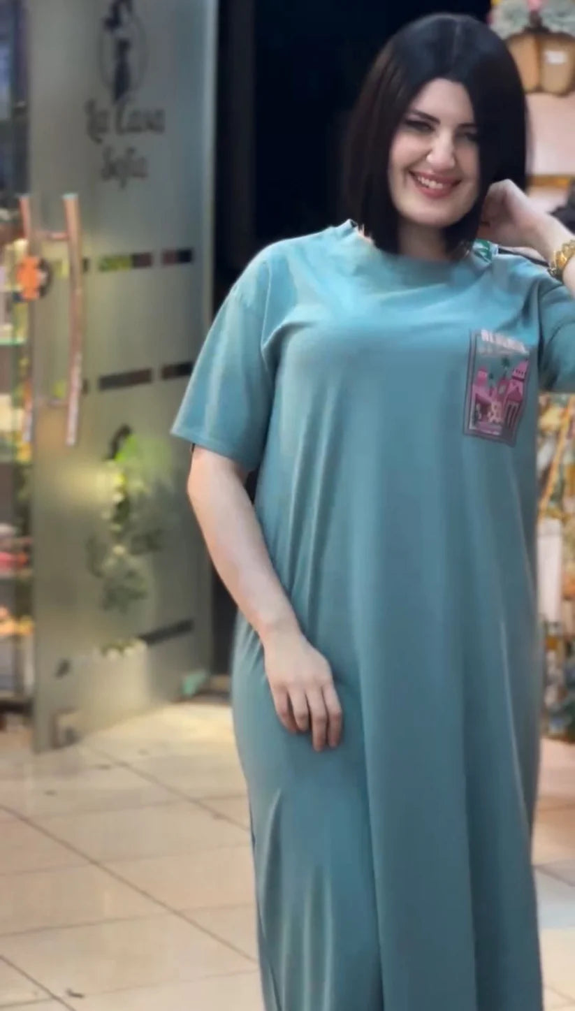 Short-sleeve t-shirt dress featuring a large "ALGERIA" graphic print with architectural and palm tree illustrations on the back 04