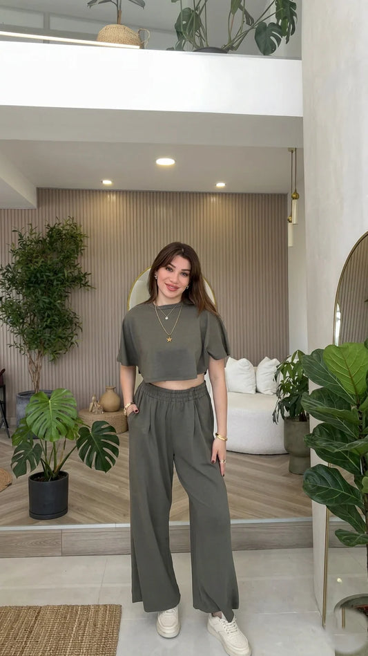Two-piece lounge set featuring a short-sleeve crop top and matching high-waisted wide-leg trousers 01