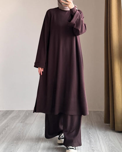 Women wearing Brown Chakoor Kashmiri winter fleece long co-ord set in Pakistan 2026 trendy modest fashion