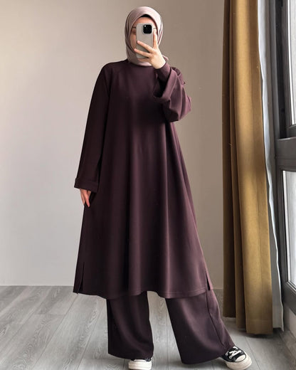 Women wearing Brown Chakoor Kashmiri winter fleece long co-ord set in Pakistan 2026 trendy modest fashion 3