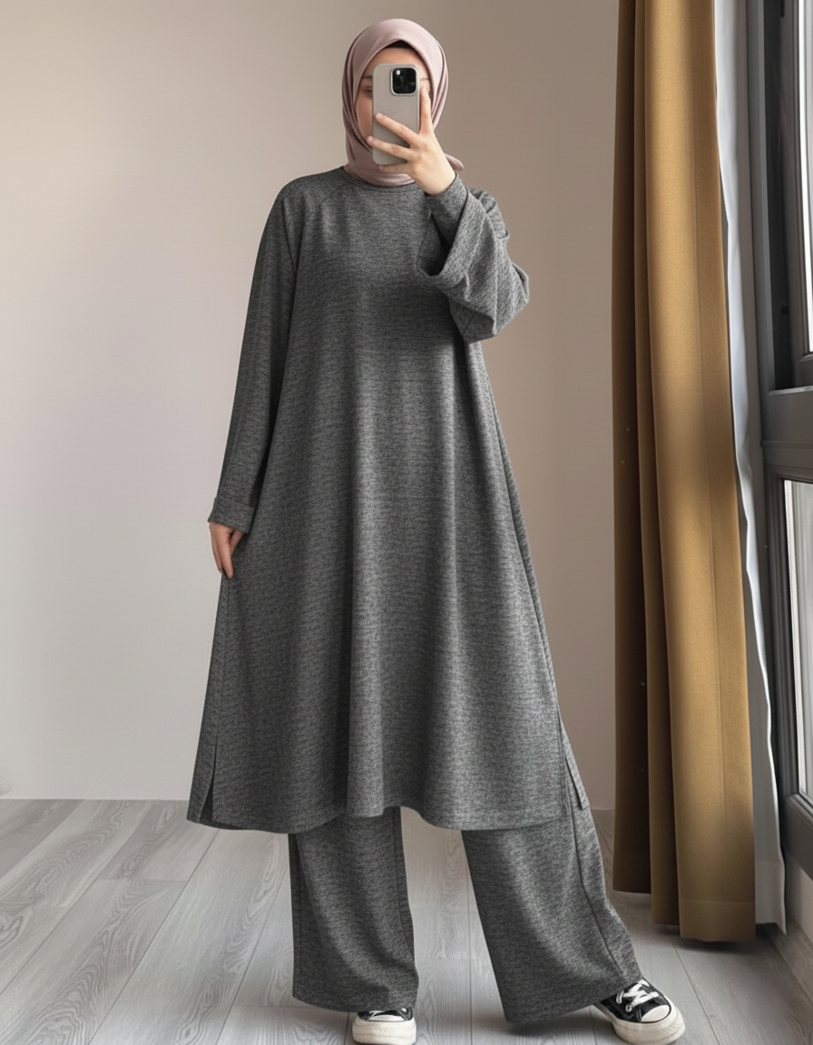 Women wearing gray Chakoor Kashmiri winter fleece long co-ord set in Pakistan 2026 trendy modest fashion