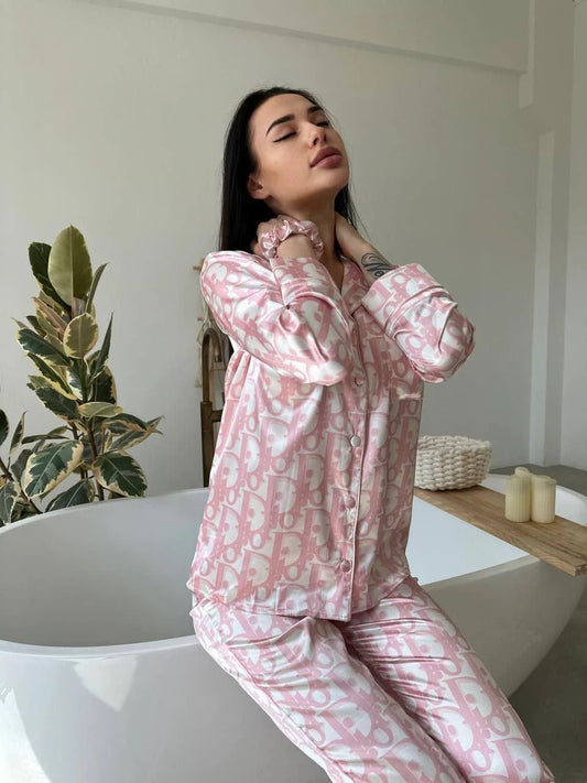 Woman wearing pink patterned pajamas silk-sexy-nighties-online-pjs